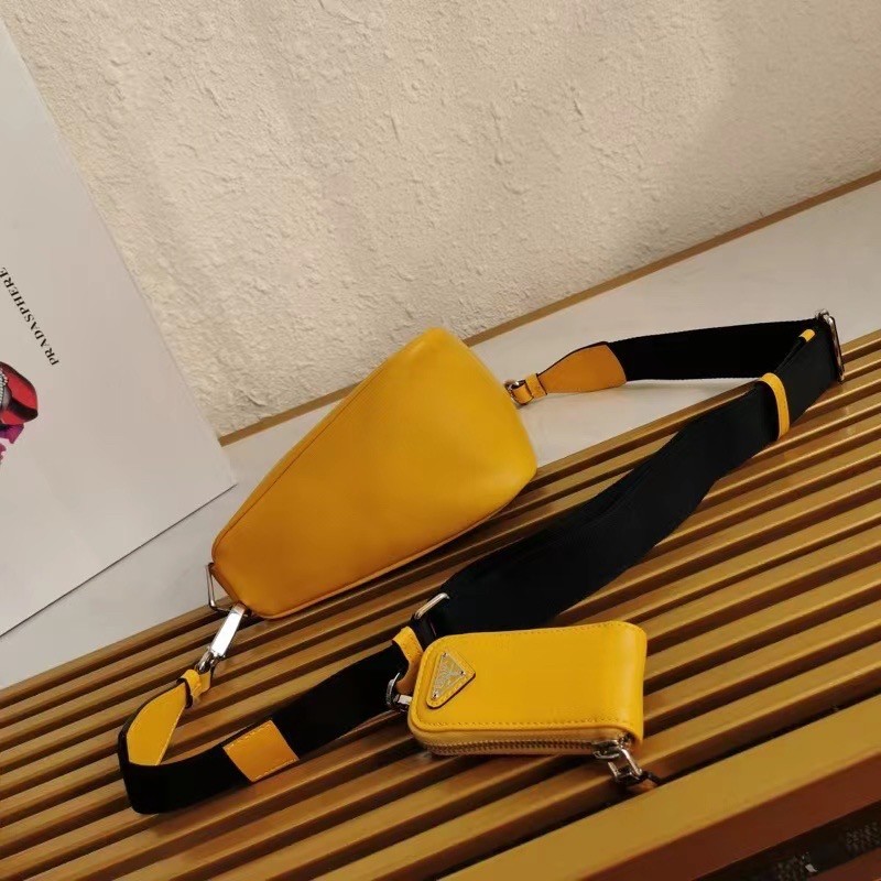 Pra*a triangle shoulder bag in yellow leather