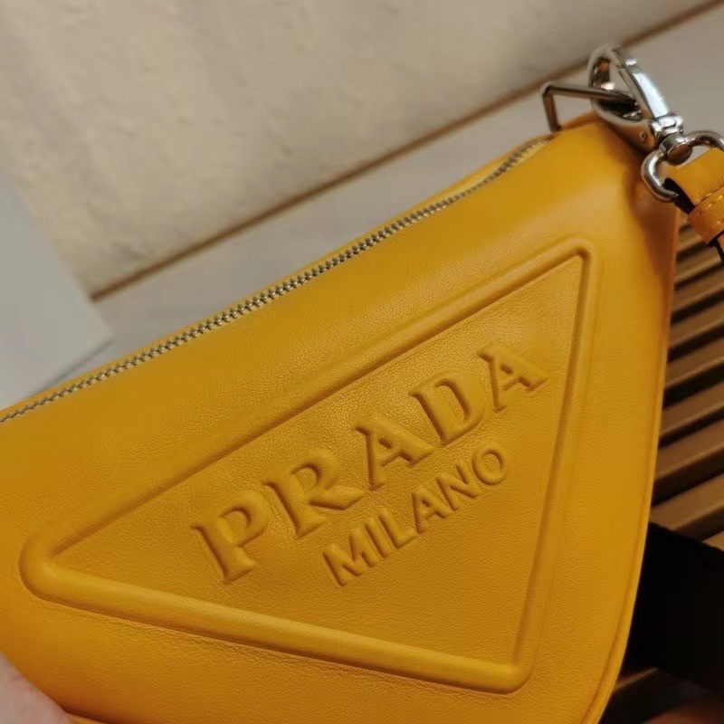 Pra*a triangle shoulder bag in yellow leather