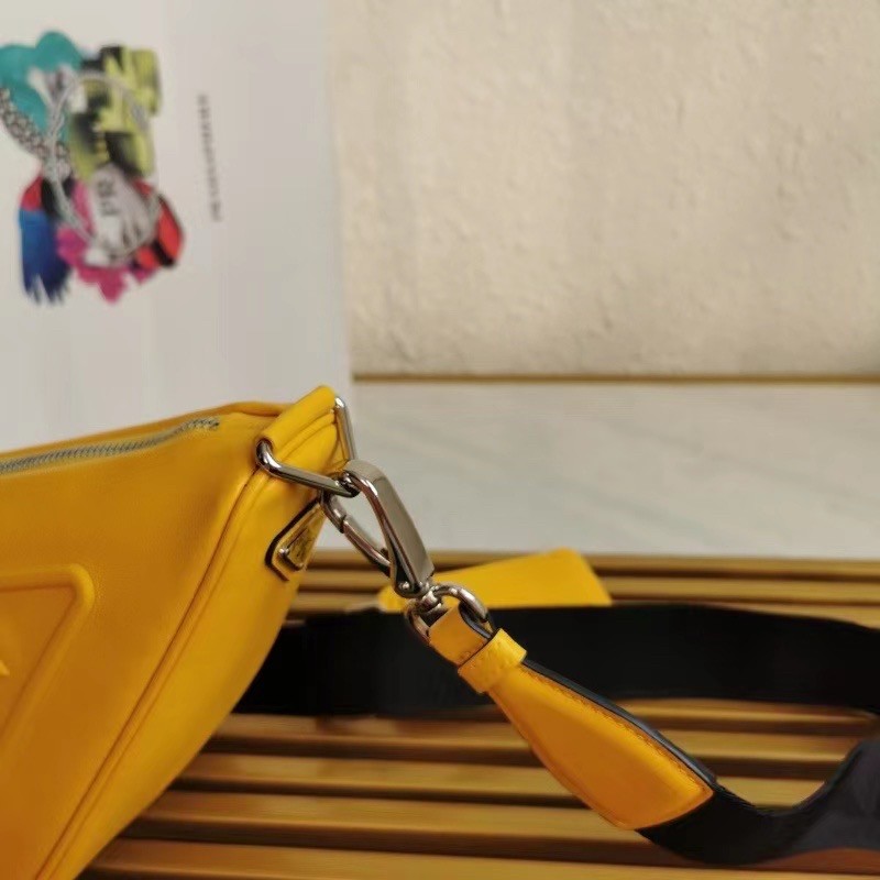 Pra*a triangle shoulder bag in yellow leather
