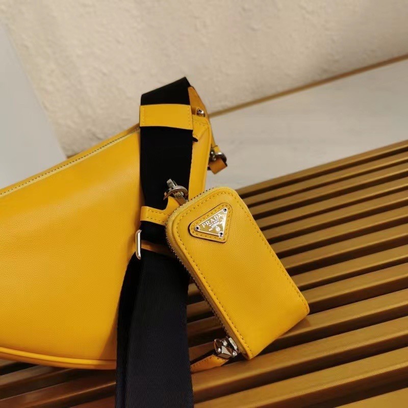 Pra*a triangle shoulder bag in yellow leather