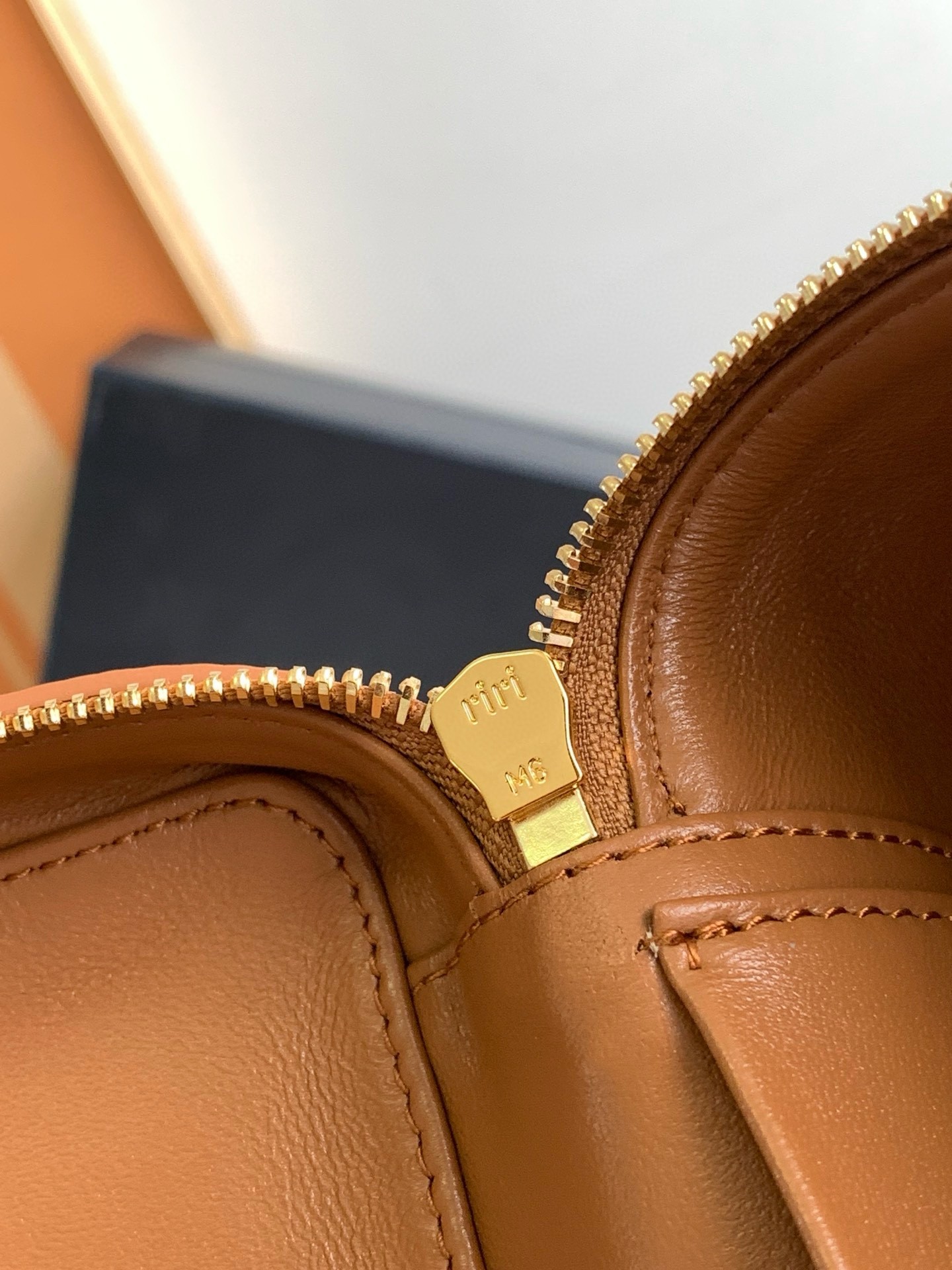 Pra*a mini vanity bag in brown grained leather