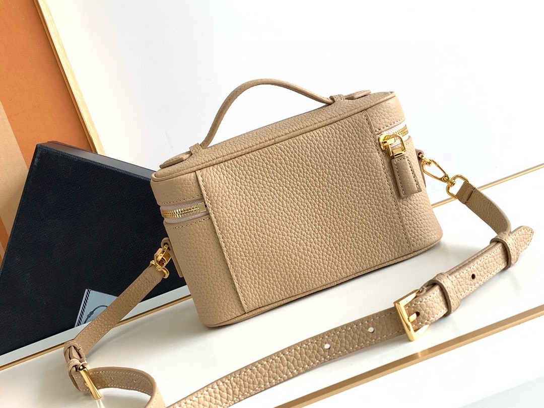 Pra*a mini vanity bag in sand beige grained leather