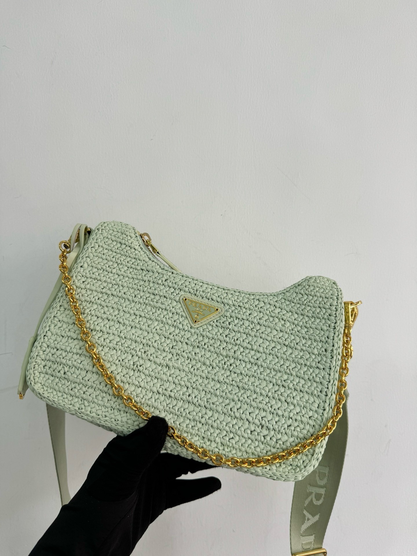 Pra*a re-edition 2005 crochet bag in aqua raffia
