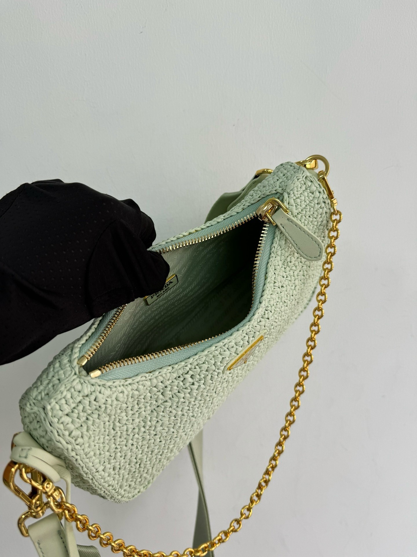 Pra*a re-edition 2005 crochet bag in aqua raffia