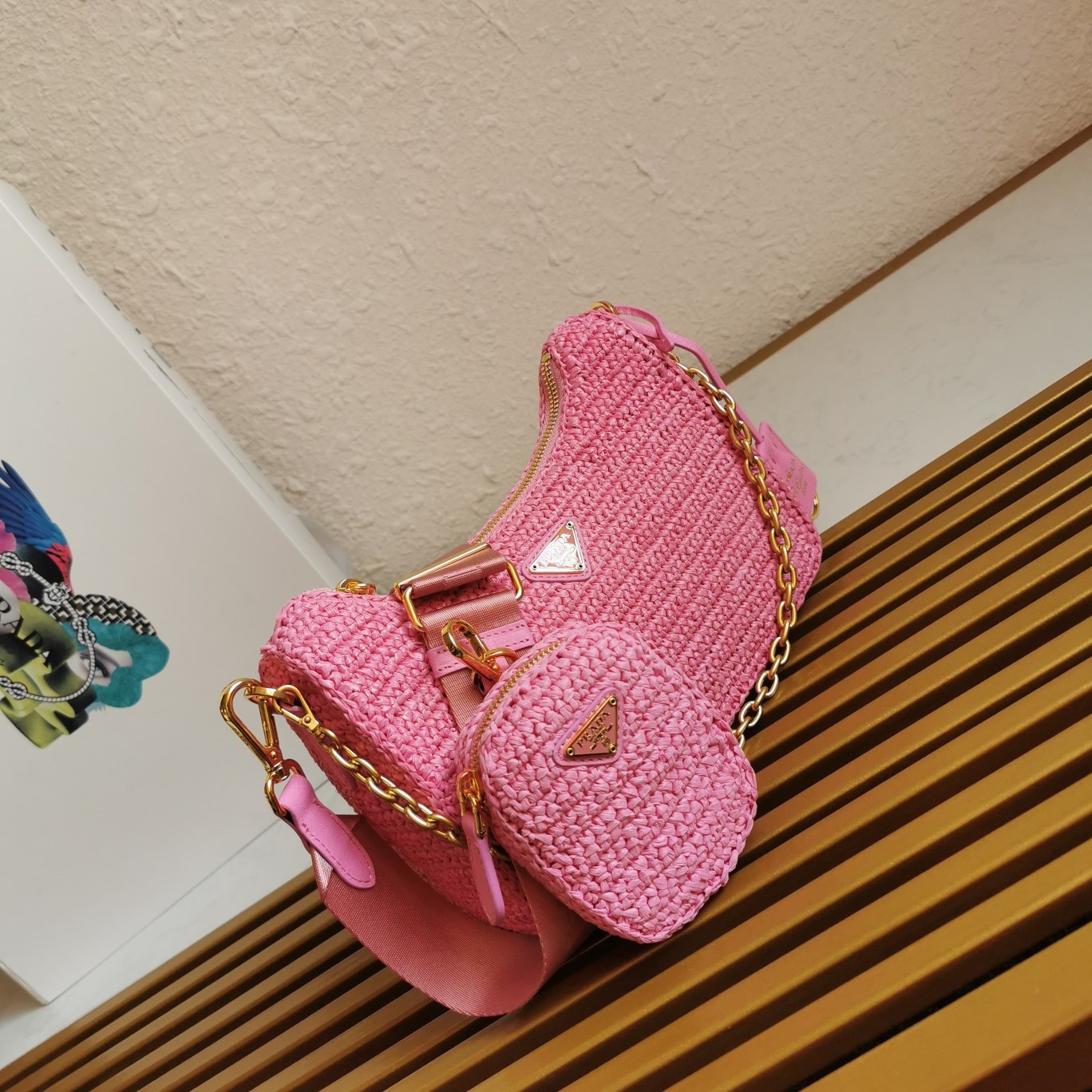 Pra*a re-edition 2005 shoulder bag in pink raffia