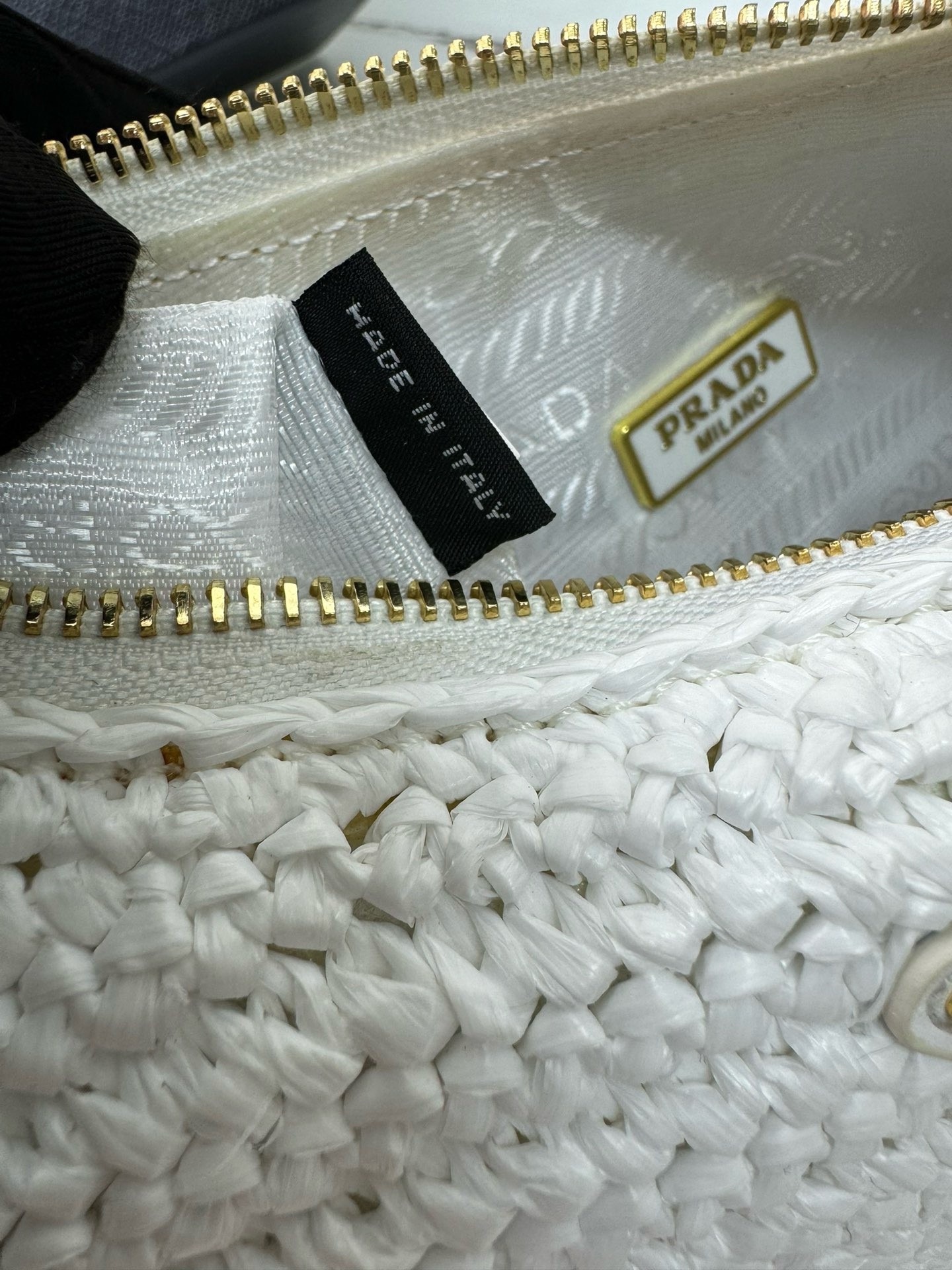 Pra*a re-edition 2005 crochet bag in white raffia