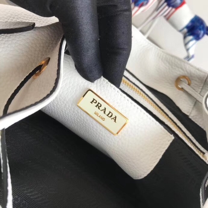 Pra*a backpack in white grained calfskin