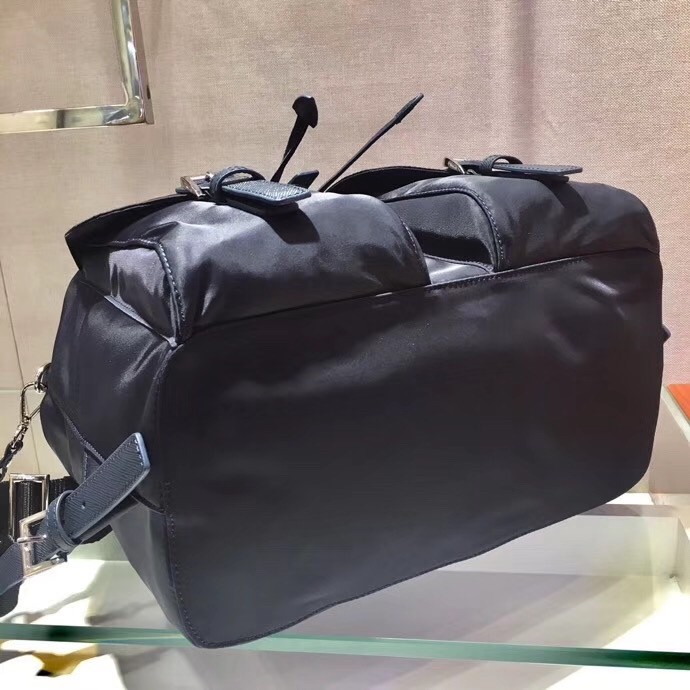 Pra*a navy blue nylon backpack with clutch