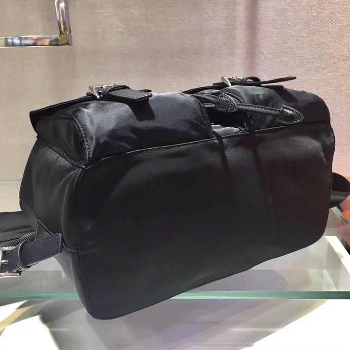 Pra*a black nylon backpack with clutch