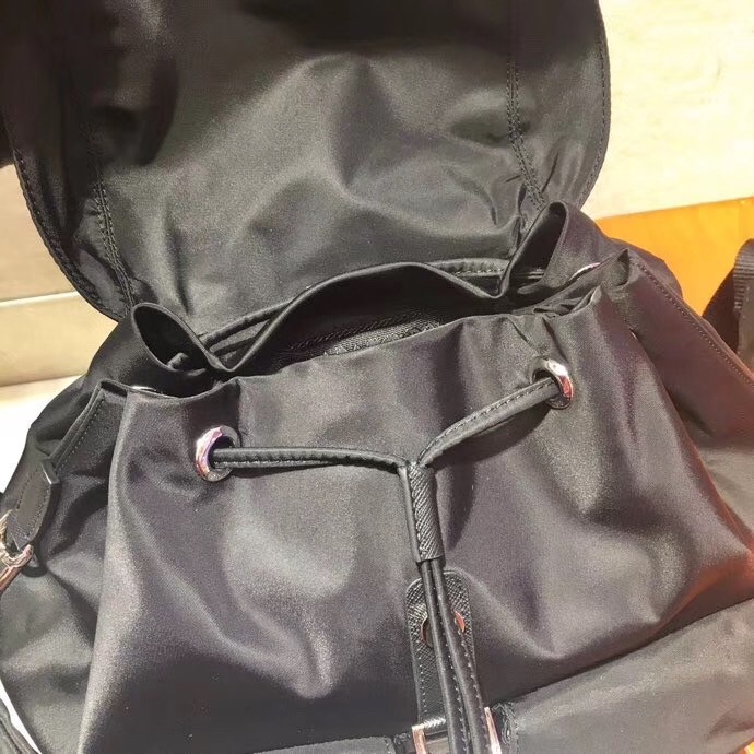Pra*a black nylon backpack with clutch