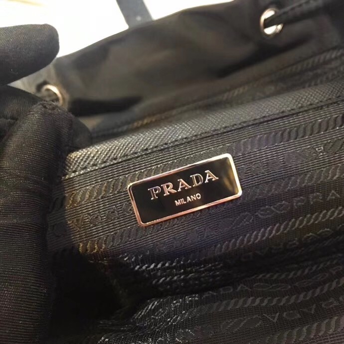 Pra*a black nylon backpack with clutch
