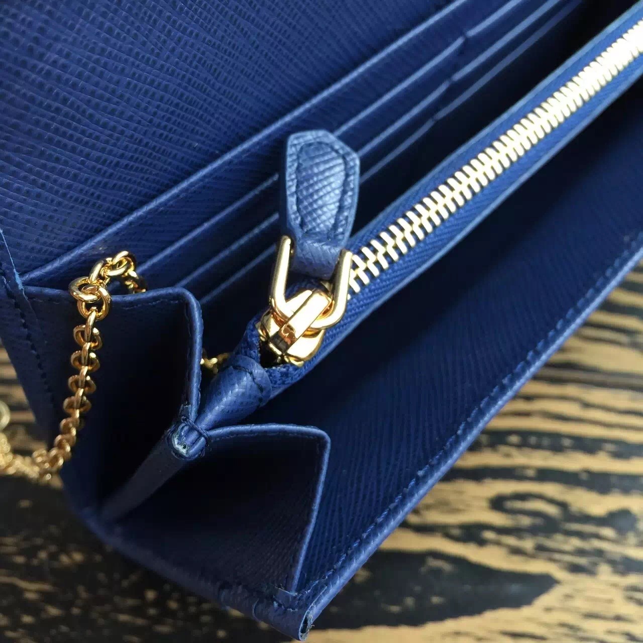 Pra*a continental wallet in blue saffiano leather