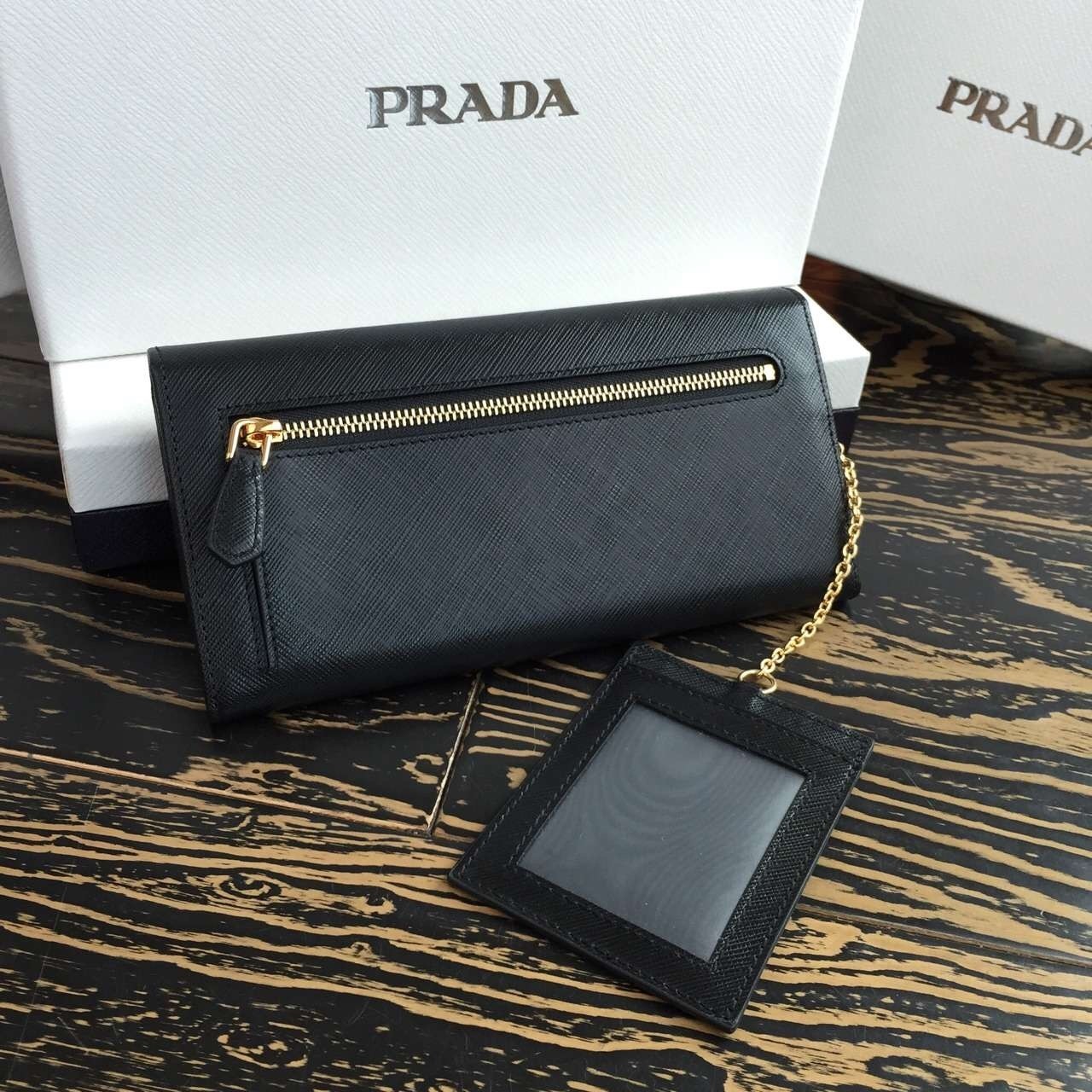 Pra*a continental wallet in black saffiano leather