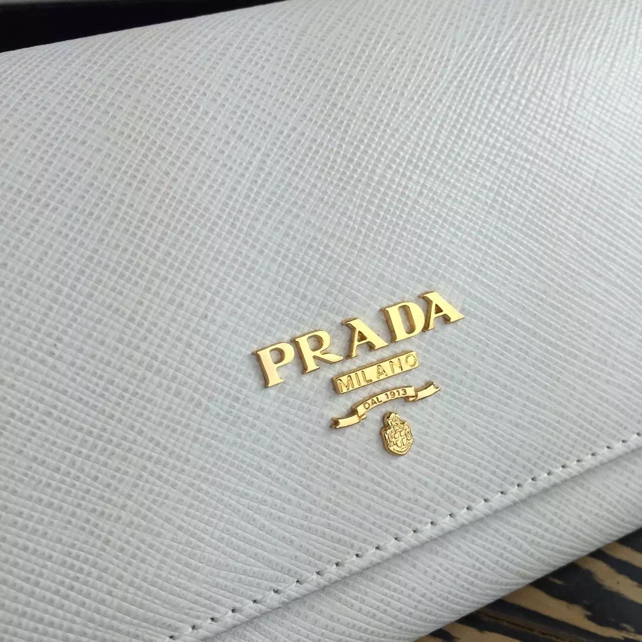 Pra*a continental wallet in white saffiano leather