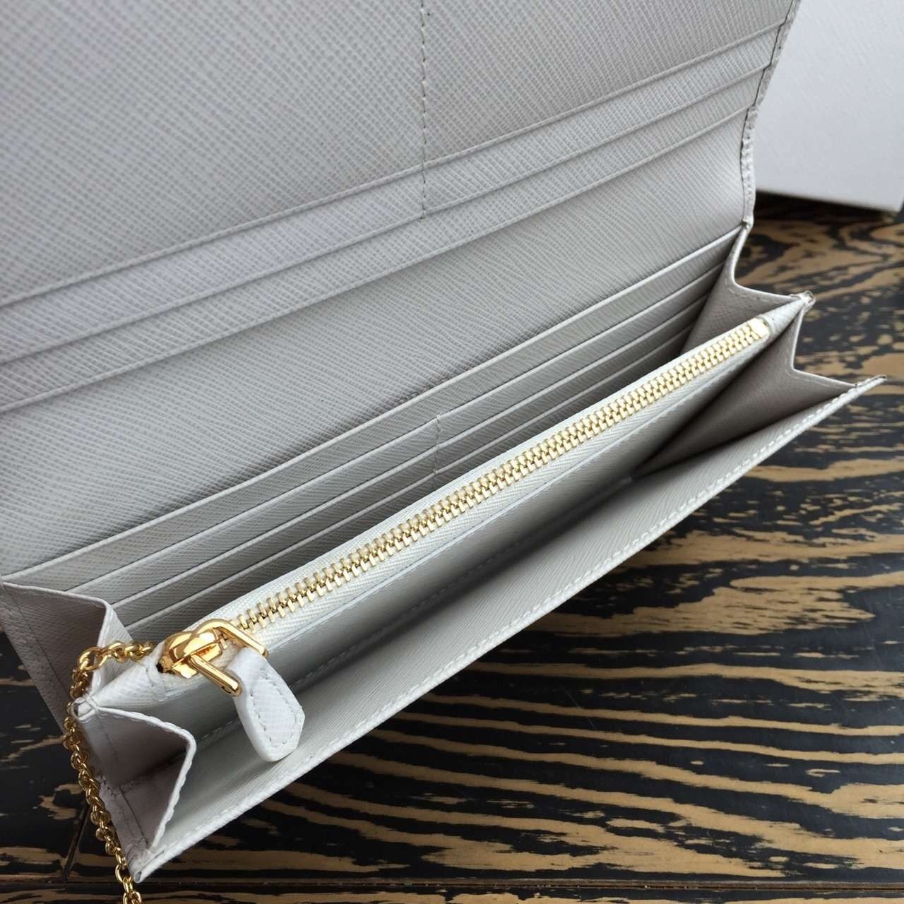 Pra*a continental wallet in white saffiano leather