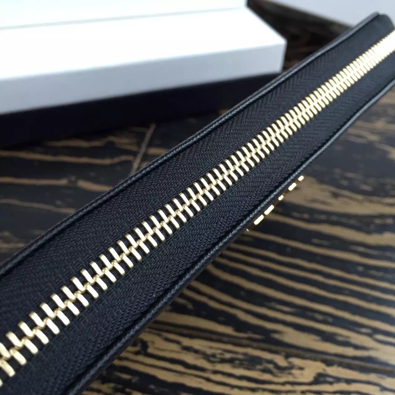 Pra*a zipped wallet in black saffiano leather