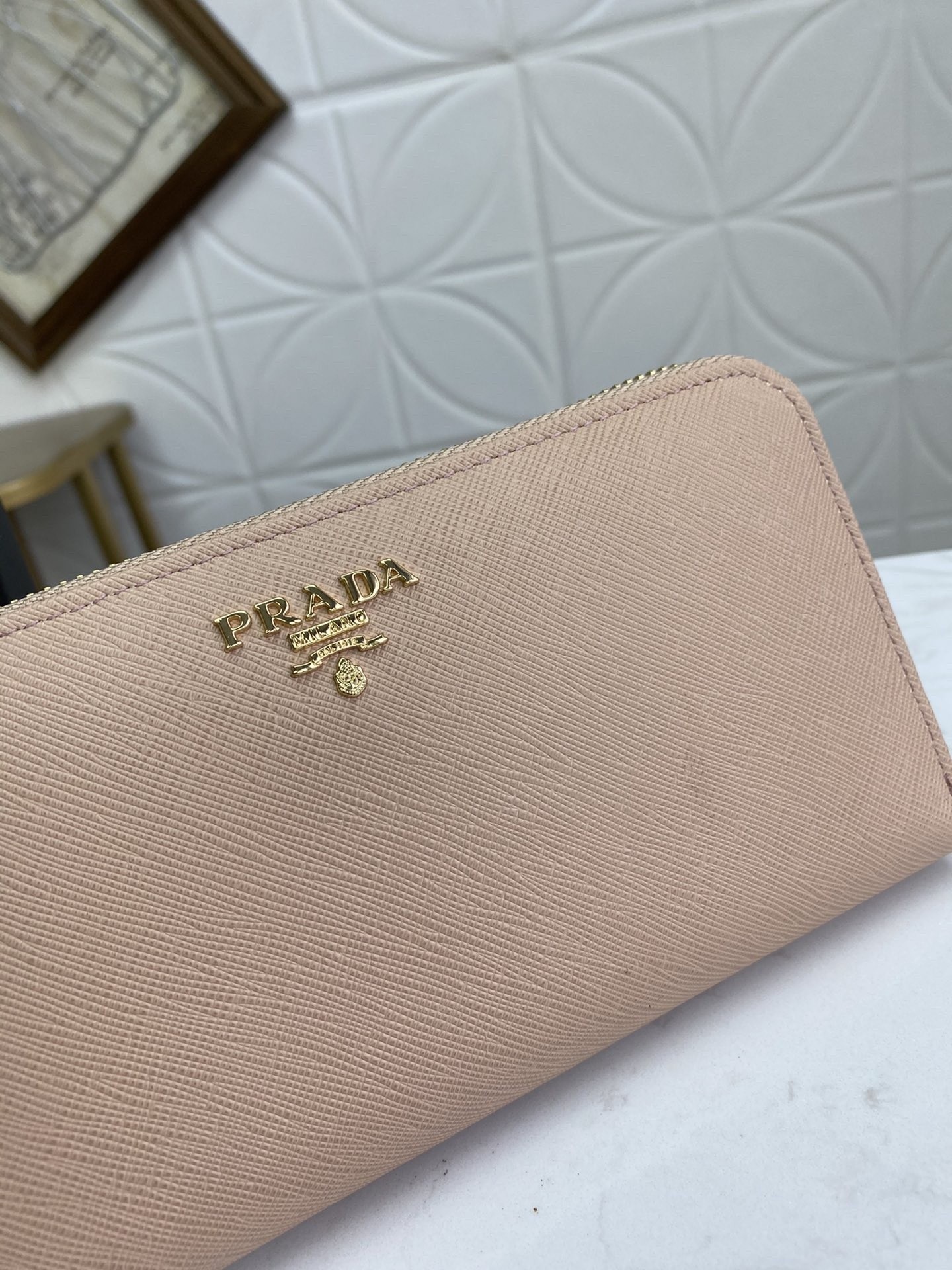 Pra*a zip around wallet in powder pink saffiano calfskin