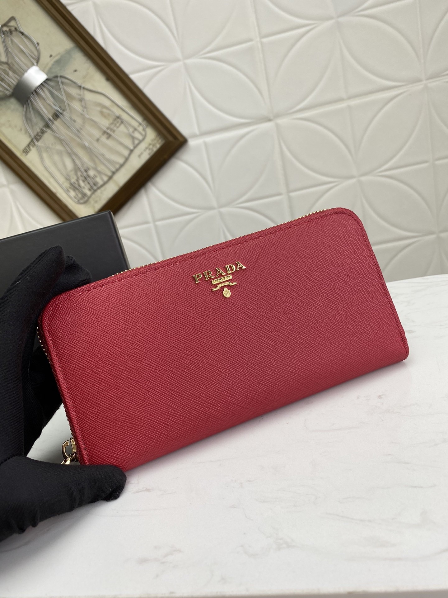 Pra*a zip around wallet in red saffiano calfskin