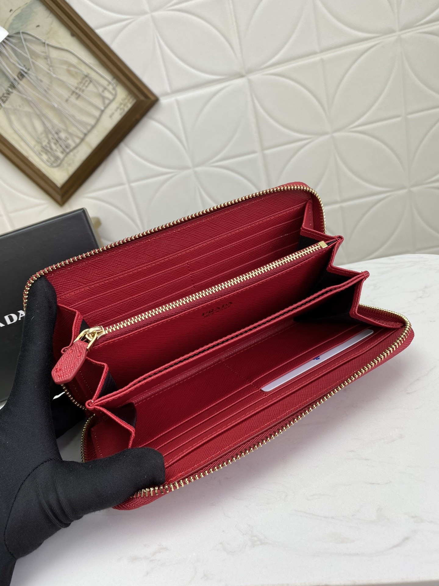 Pra*a zip around wallet in red saffiano calfskin