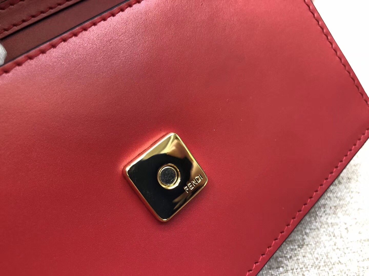F**di kan i f belt bag in red calfskin