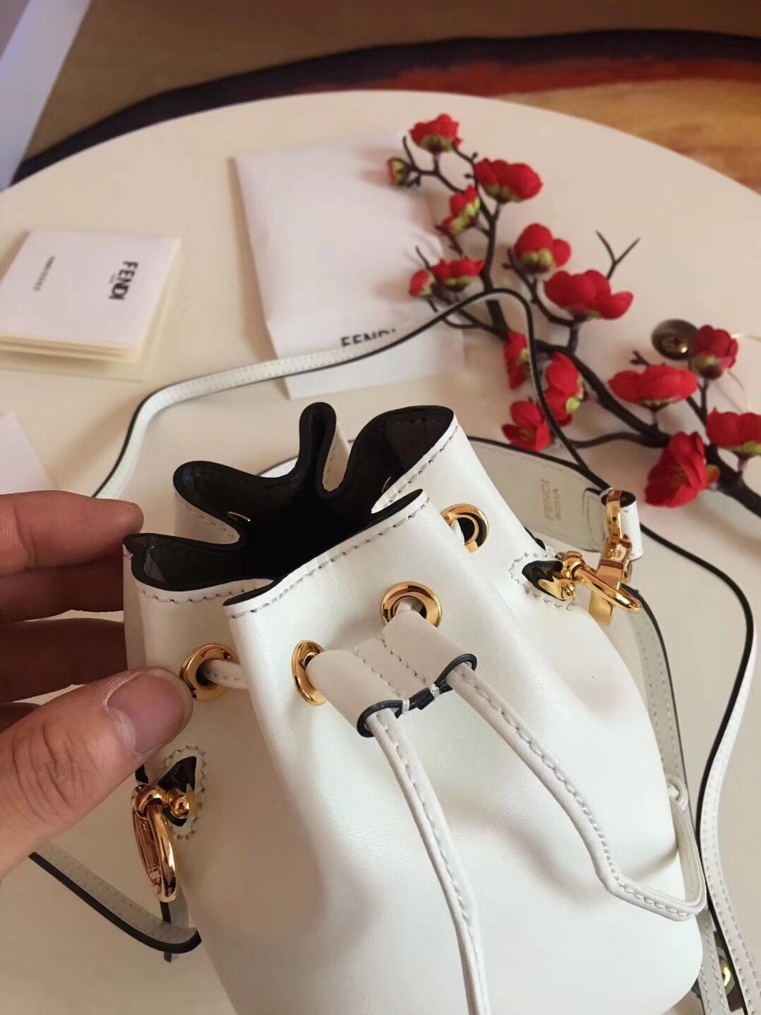 F**di mon tresor mini bucket bag in white calfskin