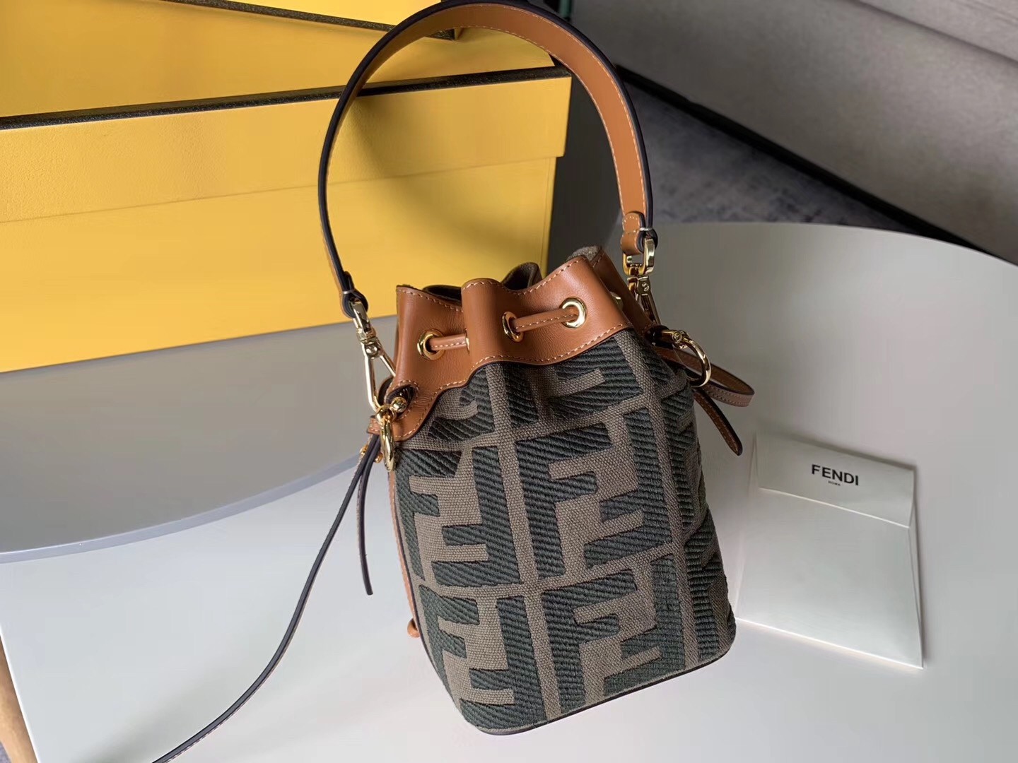F**di mon tresor mini bucket bag in green denim