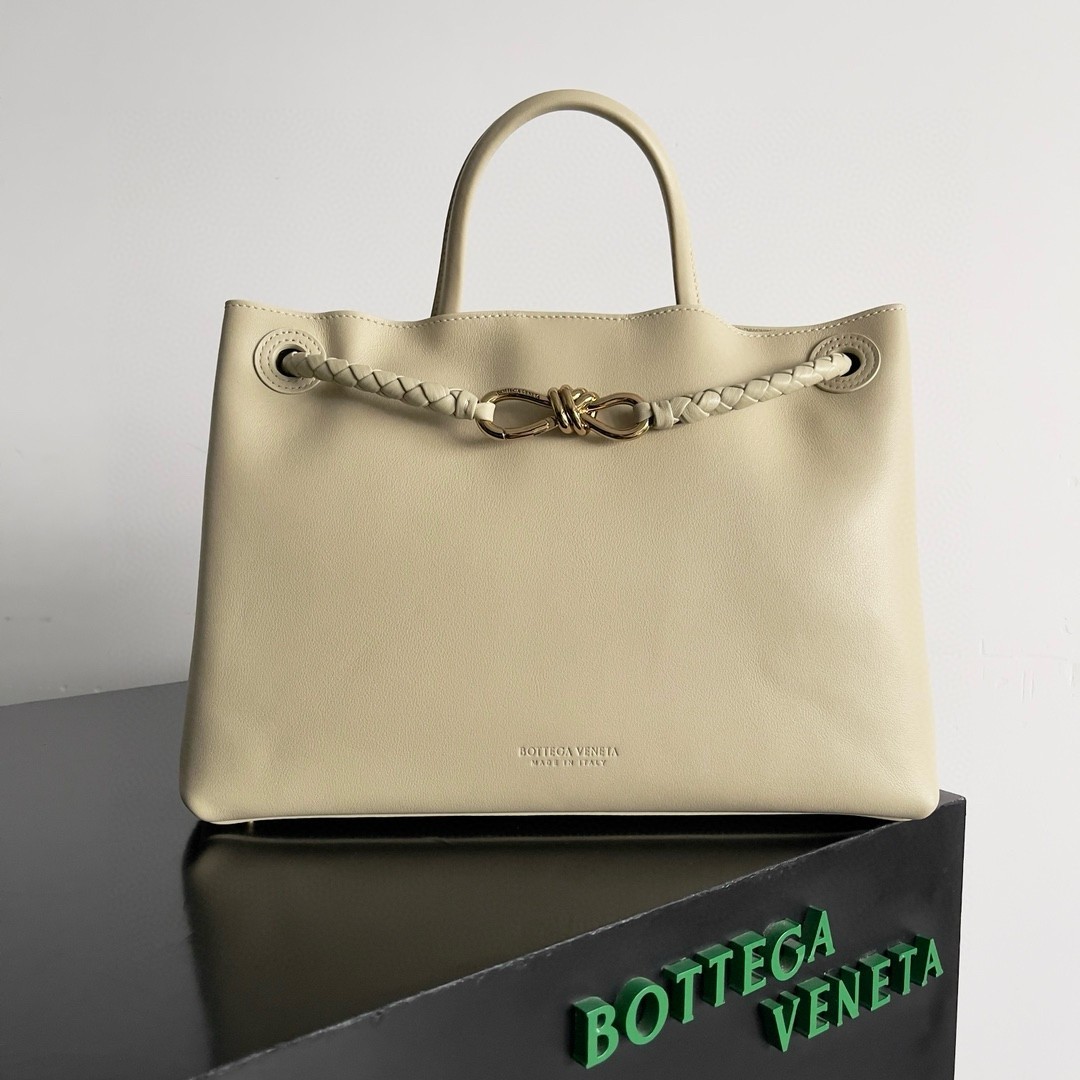 bo*te*ga Ve*ne*ta medium andiamo bag in beige smooth calfskin
