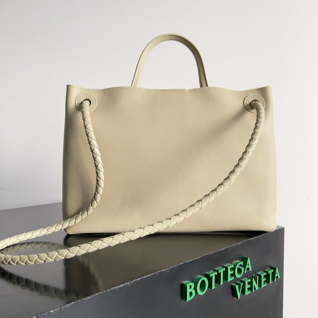 bo*te*ga Ve*ne*ta medium andiamo bag in beige smooth calfskin