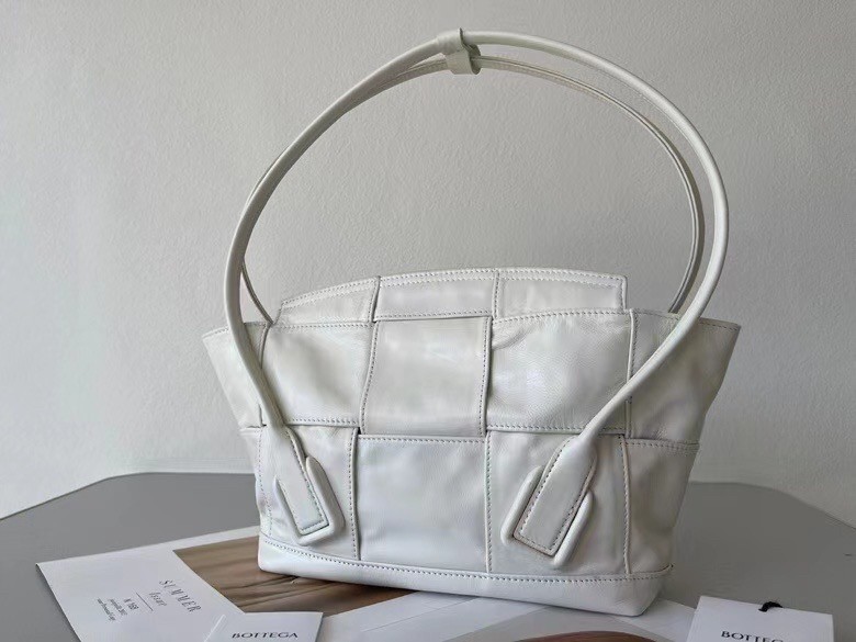 bo*te*ga Ve*ne*ta arco small bag in white intrecciato leather