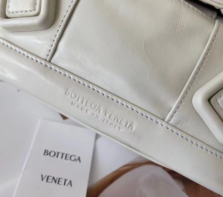 bo*te*ga Ve*ne*ta arco small bag in white intrecciato leather