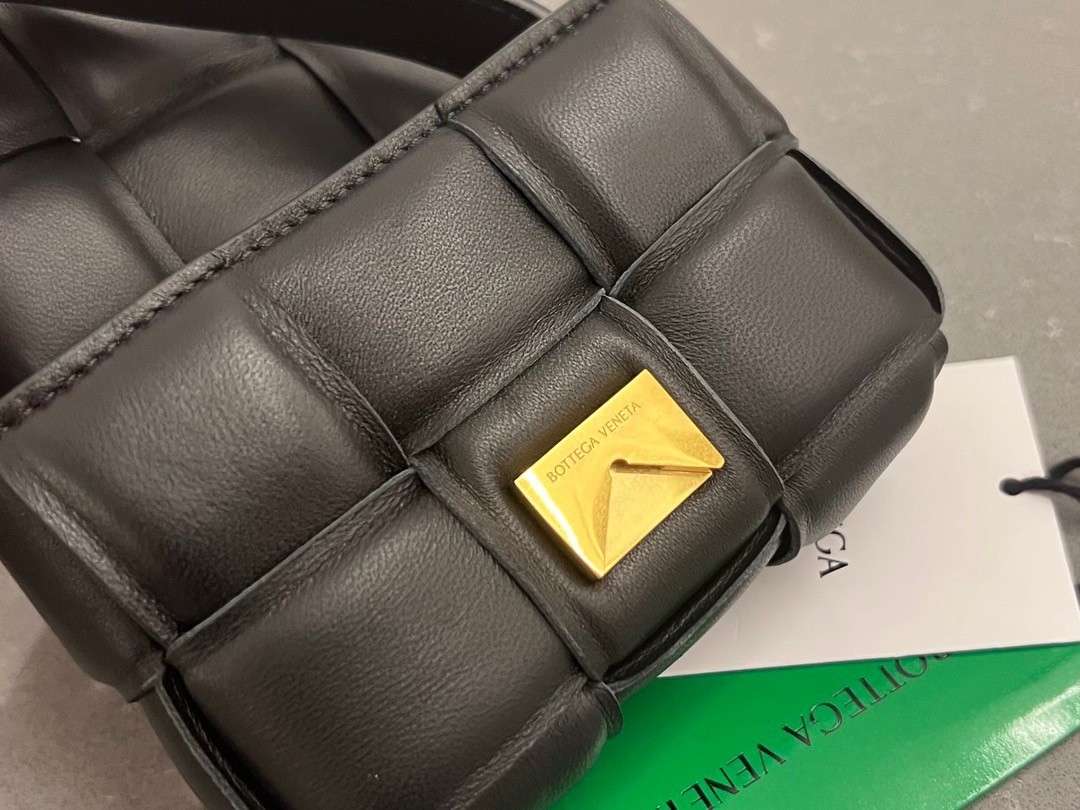 bo*te*ga Ve*ne*ta candy padded cassette bag in black lambskin