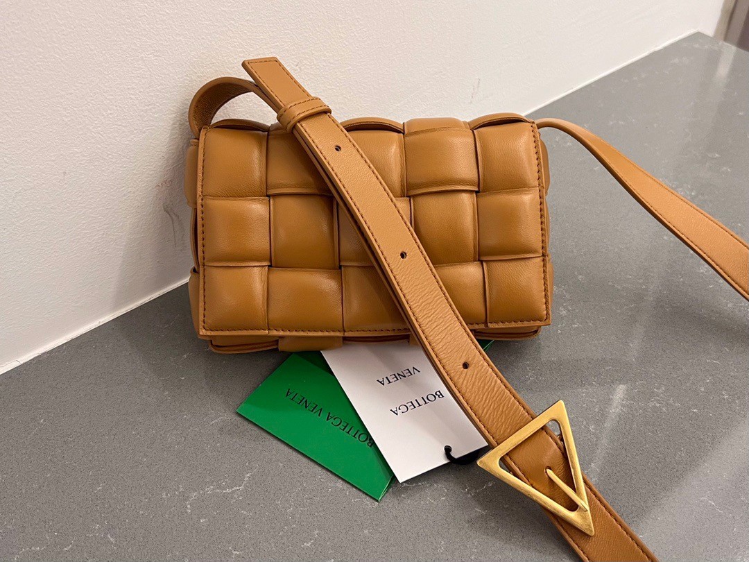 bo*te*ga Ve*ne*ta small padded cassette bag in camel lambskin