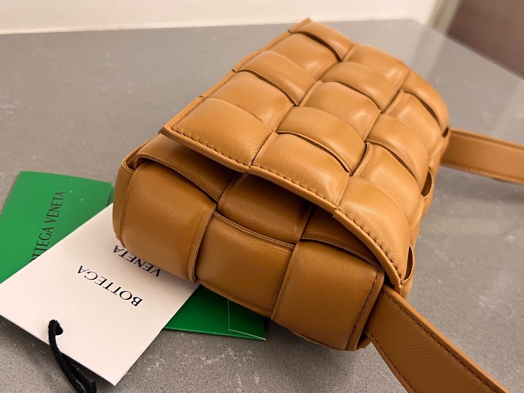 bo*te*ga Ve*ne*ta small padded cassette bag in camel lambskin