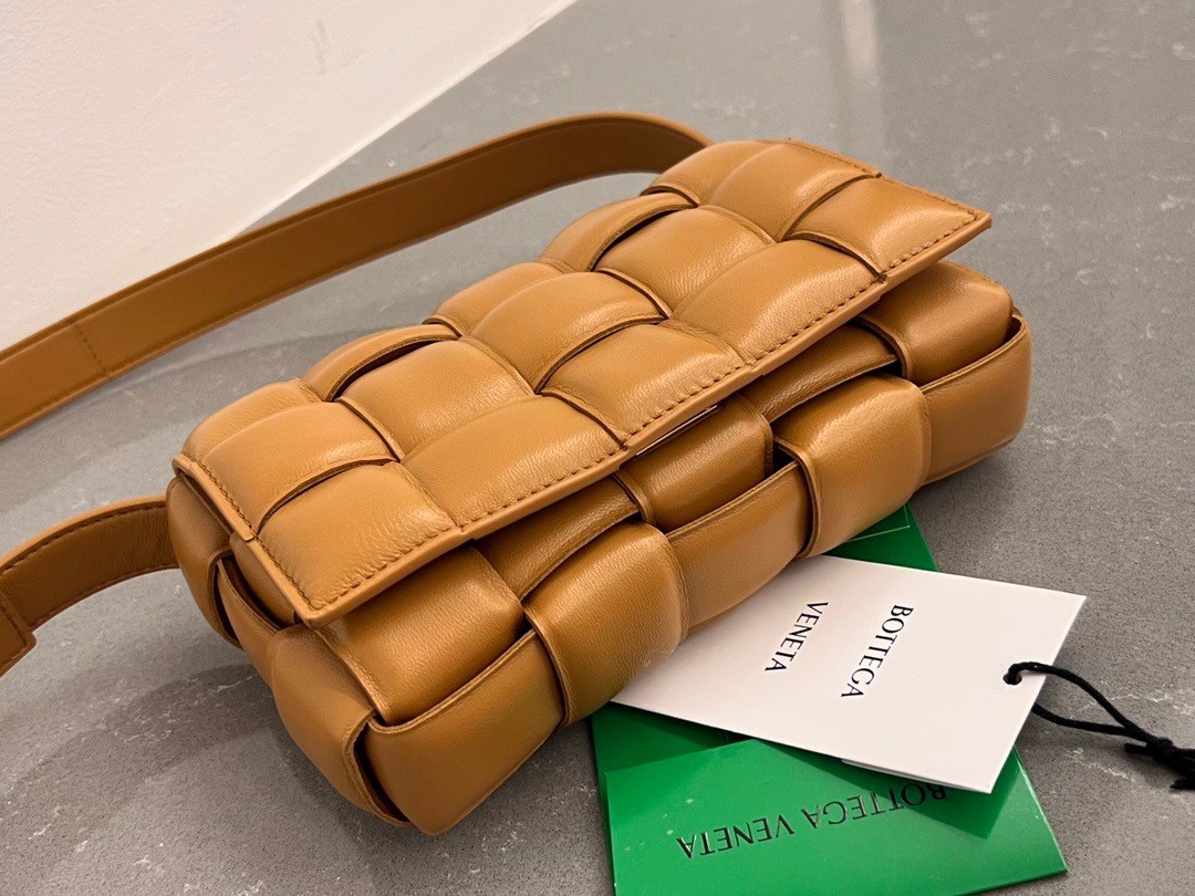 bo*te*ga Ve*ne*ta small padded cassette bag in camel lambskin