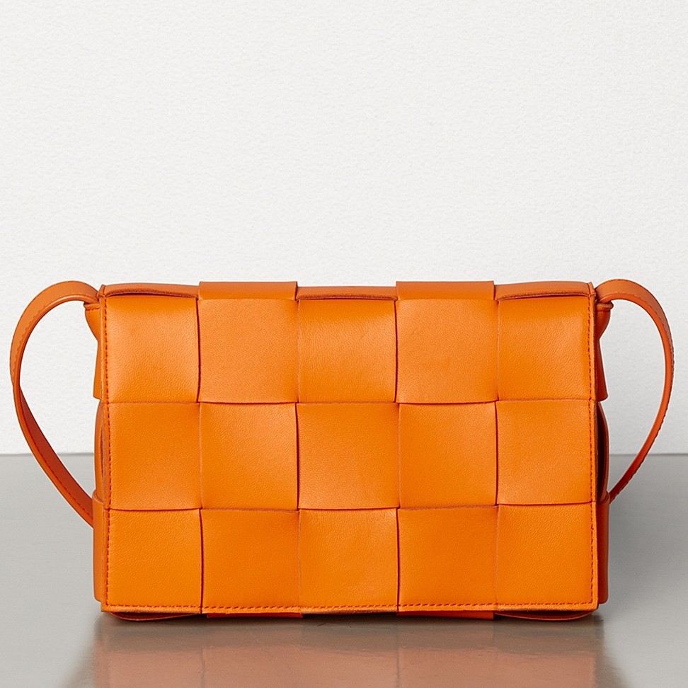 bo*te*ga Ve*ne*ta cassette bag in orange lambskin