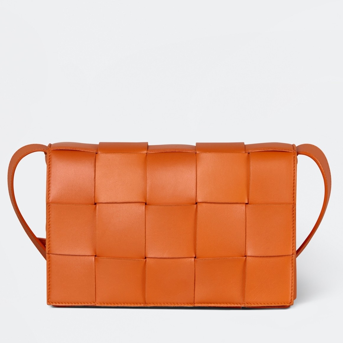 bo*te*ga Ve*ne*ta cassett bag in orange intrecciato lambskin