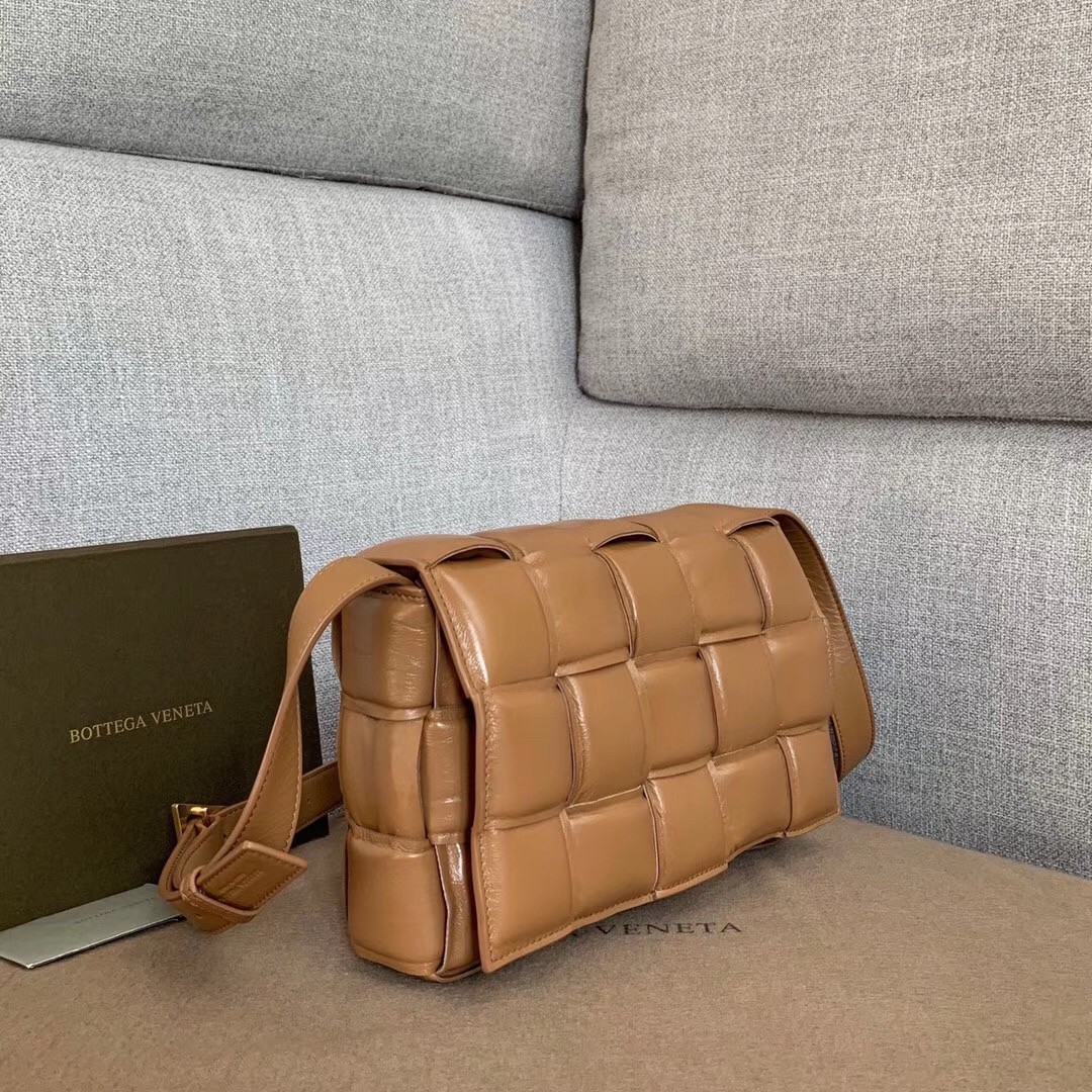 bo*te*ga Ve*ne*ta padded cassette bag in caramel calfskin