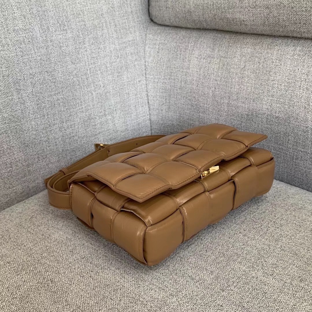 bo*te*ga Ve*ne*ta padded cassette bag in caramel calfskin