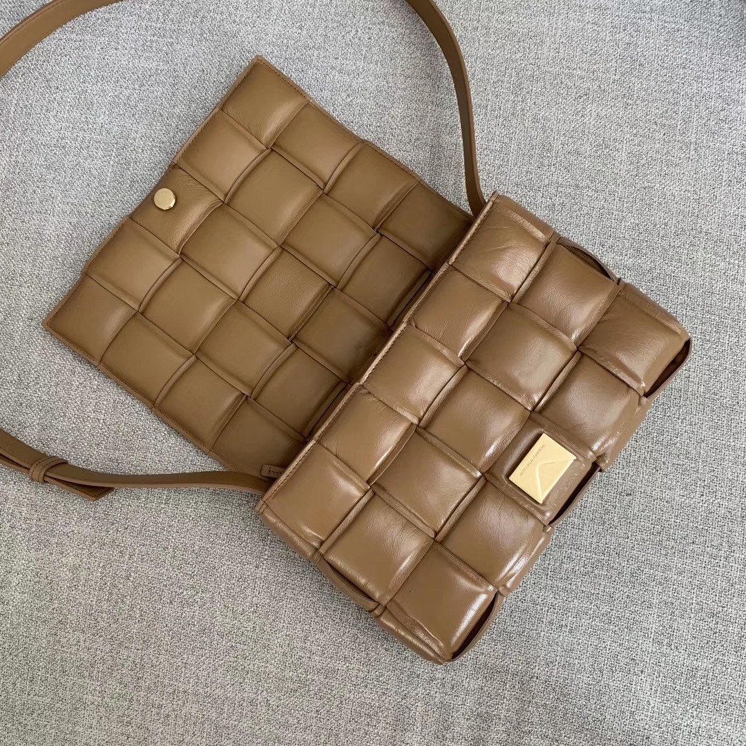 bo*te*ga Ve*ne*ta padded cassette bag in caramel calfskin