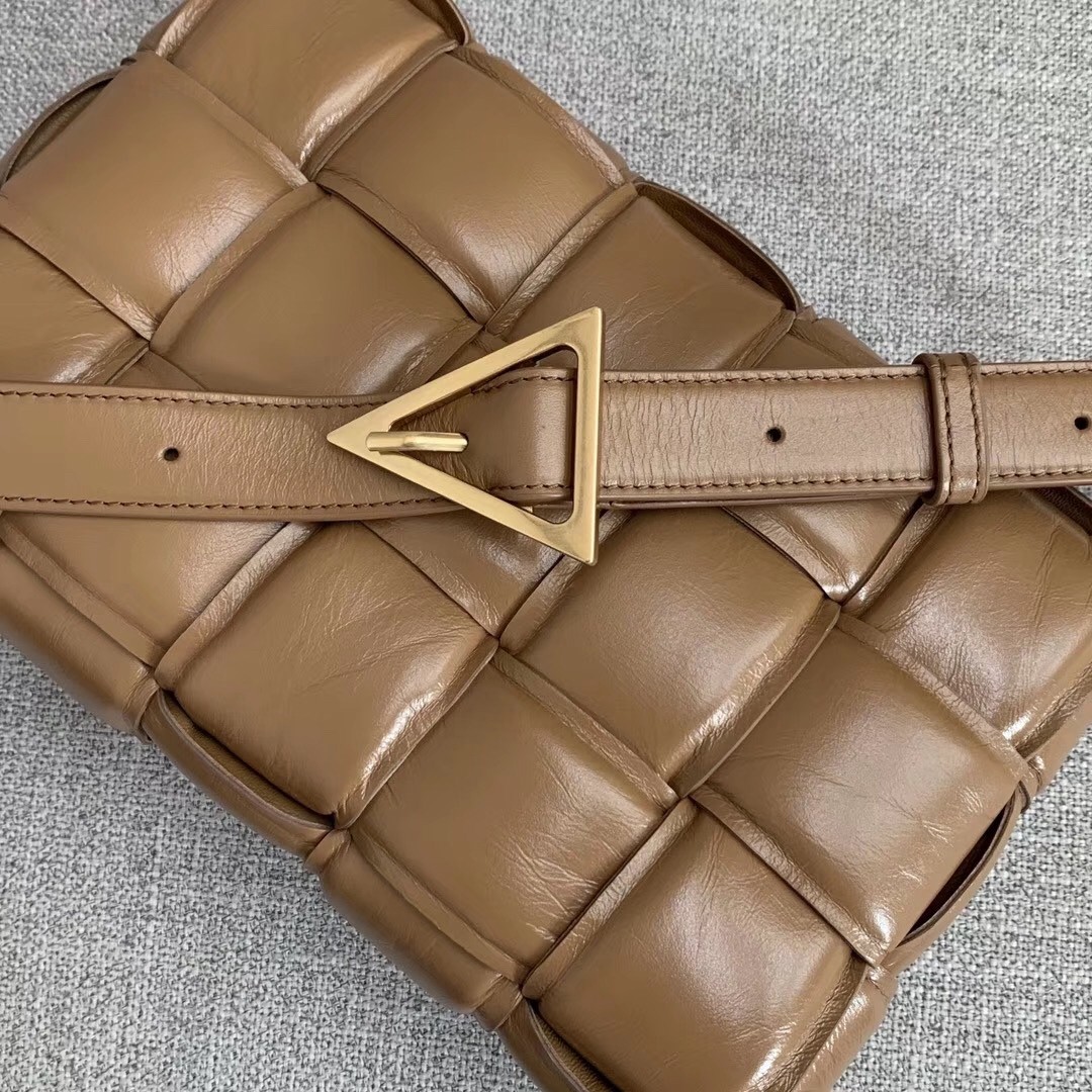bo*te*ga Ve*ne*ta padded cassette bag in caramel calfskin