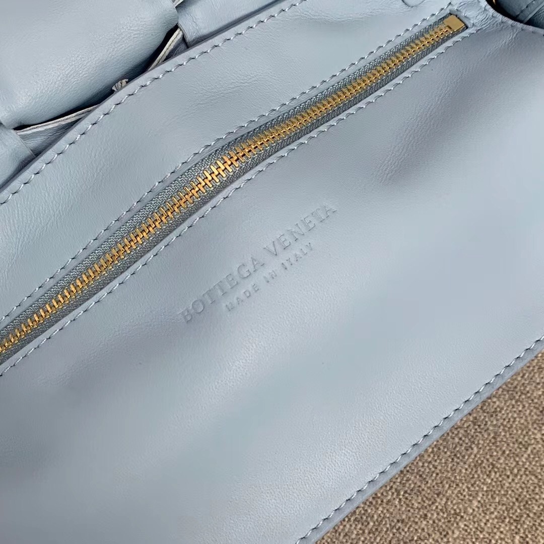 bo*te*ga Ve*ne*ta padded cassette bag in ice calfskin