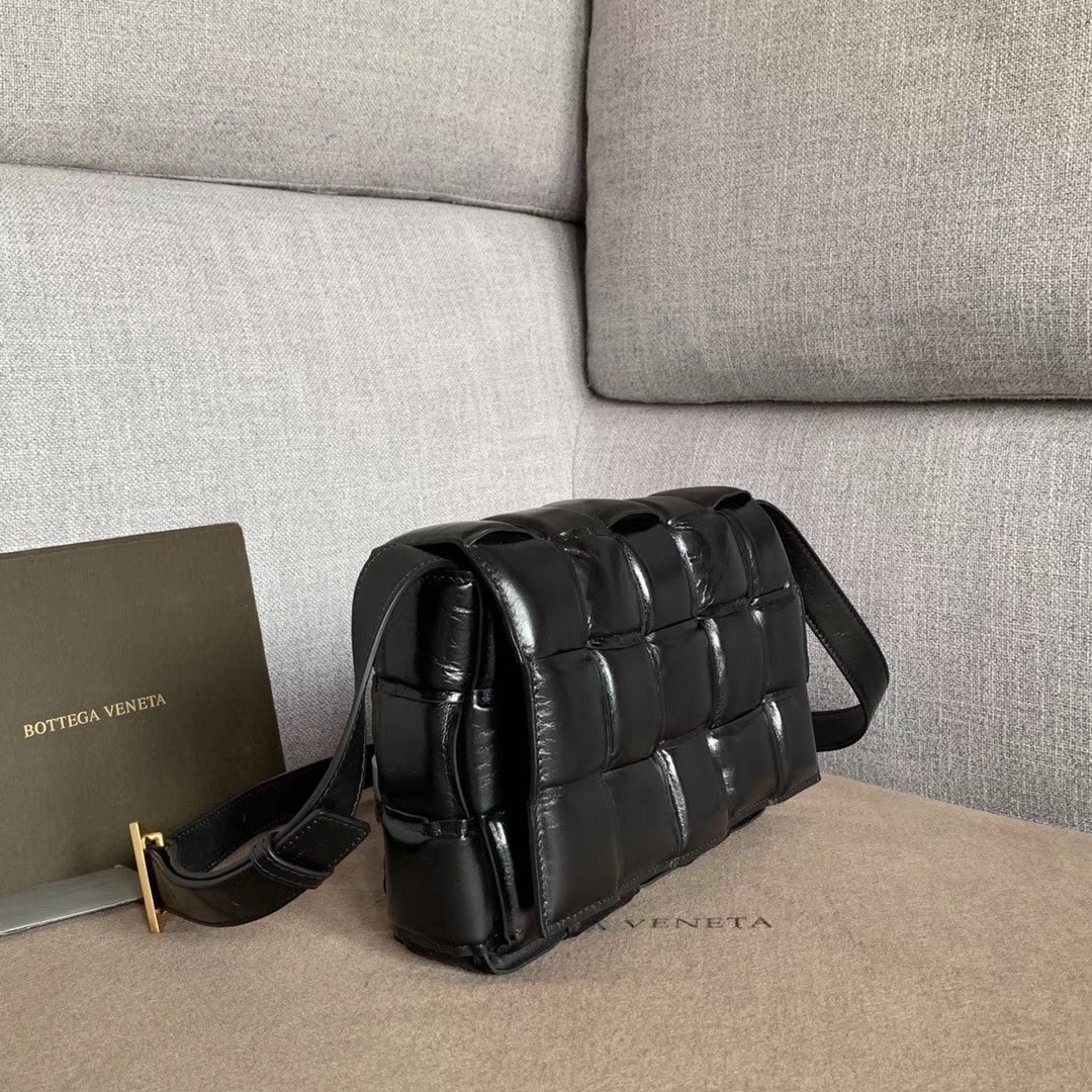 bo*te*ga Ve*ne*ta padded cassette bag in black calfskin