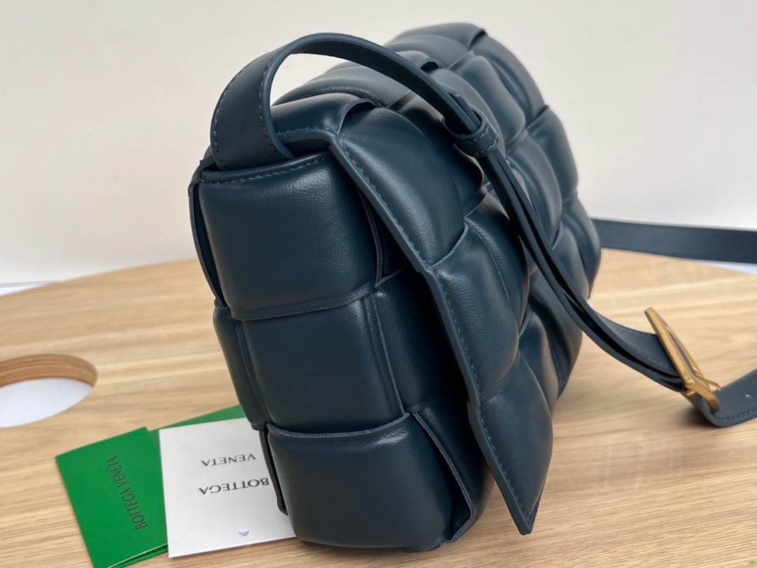 bo*te*ga Ve*ne*ta padded cassette bag in dark blue intrecciato lambskin