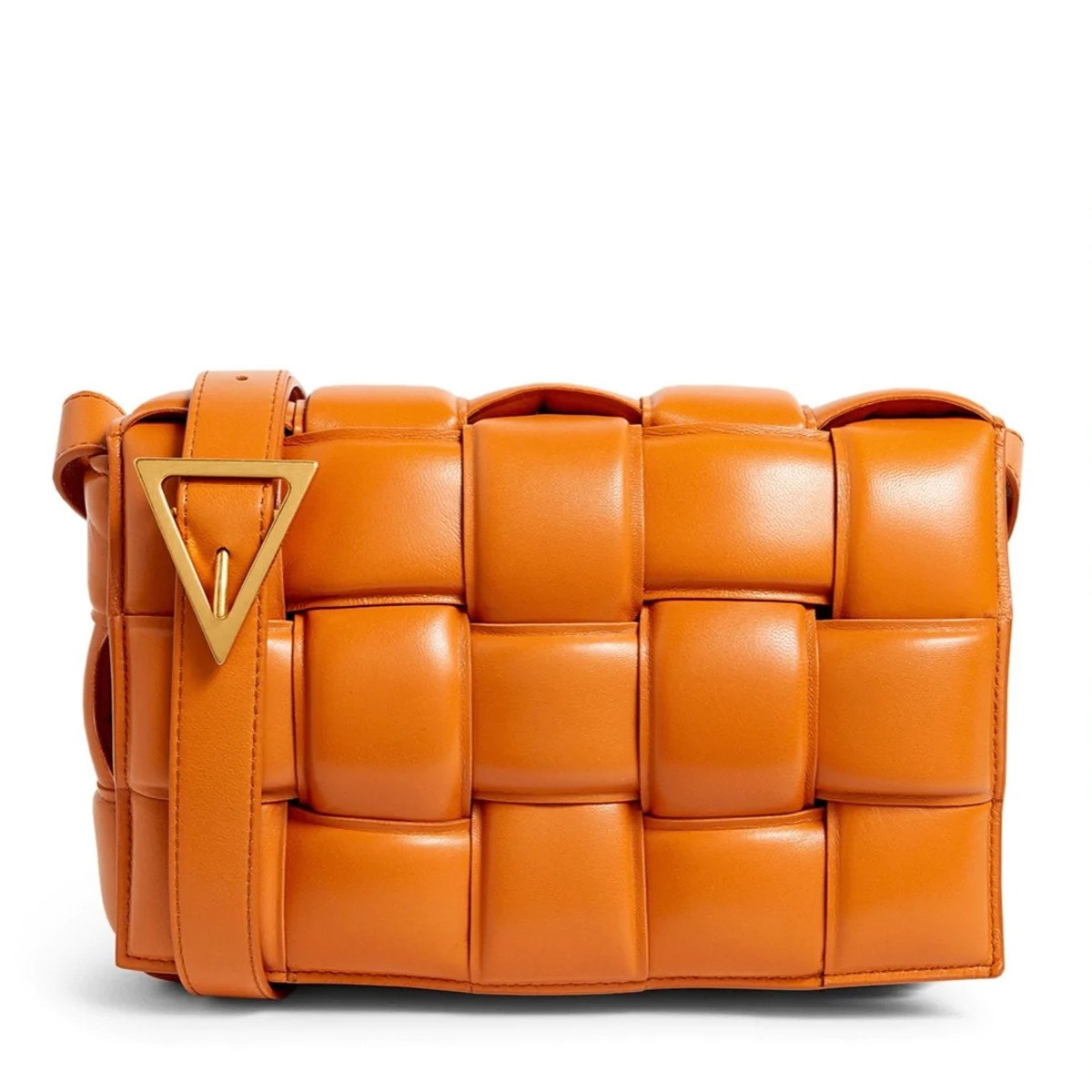 bo*te*ga Ve*ne*ta padded cassette bag in orange lambskin