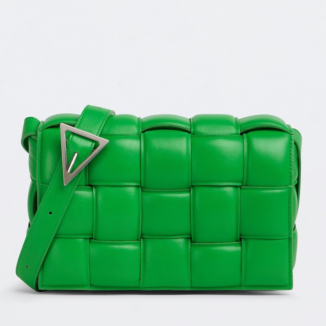 bo*te*ga Ve*ne*ta padded cassette bag in green lambskin