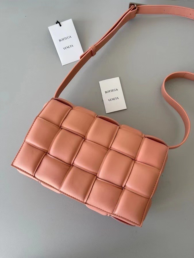 bo*te*ga Ve*ne*ta padded cassette bag in peachy lambskin