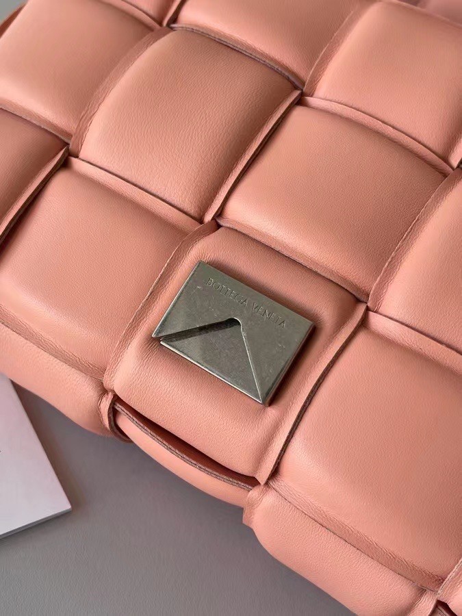 bo*te*ga Ve*ne*ta padded cassette bag in peachy lambskin