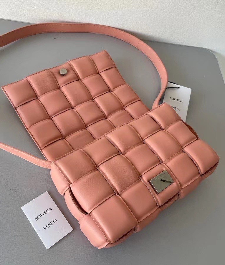 bo*te*ga Ve*ne*ta padded cassette bag in peachy lambskin