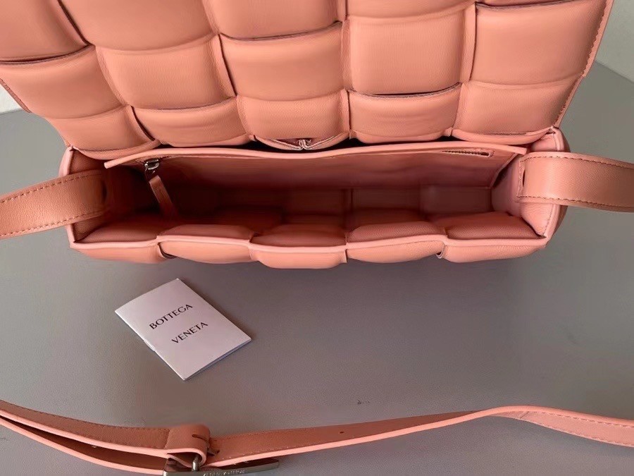 bo*te*ga Ve*ne*ta padded cassette bag in peachy lambskin