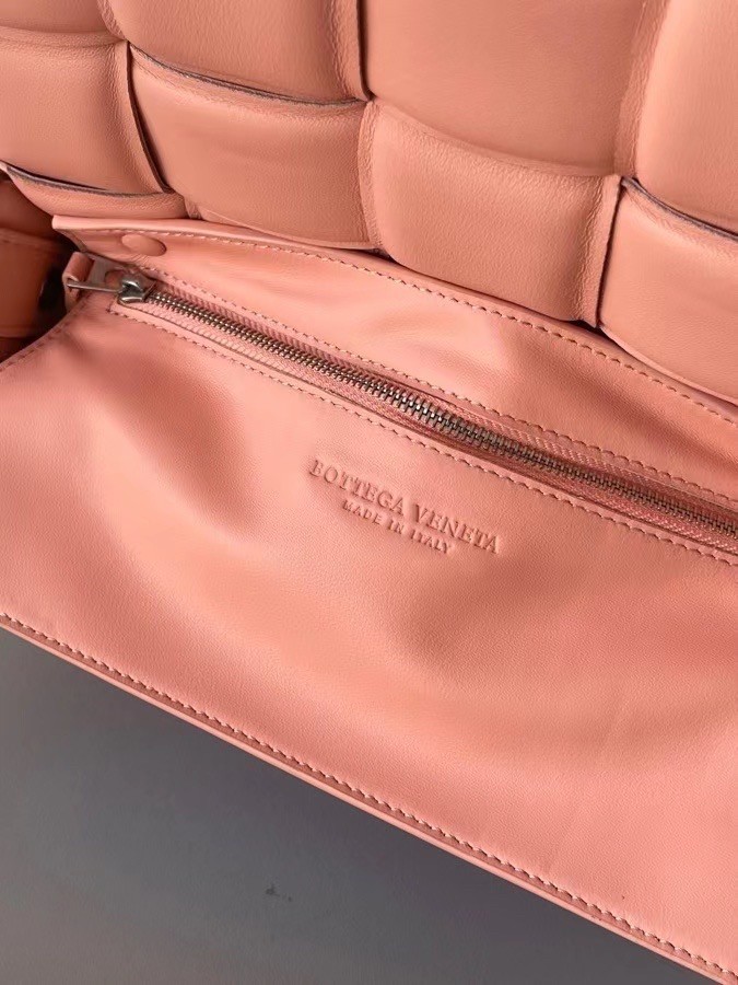 bo*te*ga Ve*ne*ta padded cassette bag in peachy lambskin